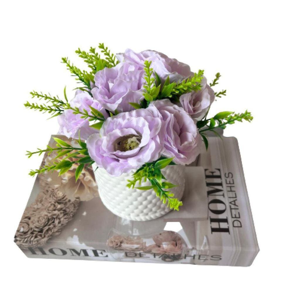 Livro decorativo `Home` e vaso branco de cerâmica trabalhado