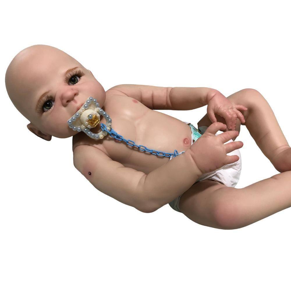 Bebe bebe reborn menino com acessorio e silicone