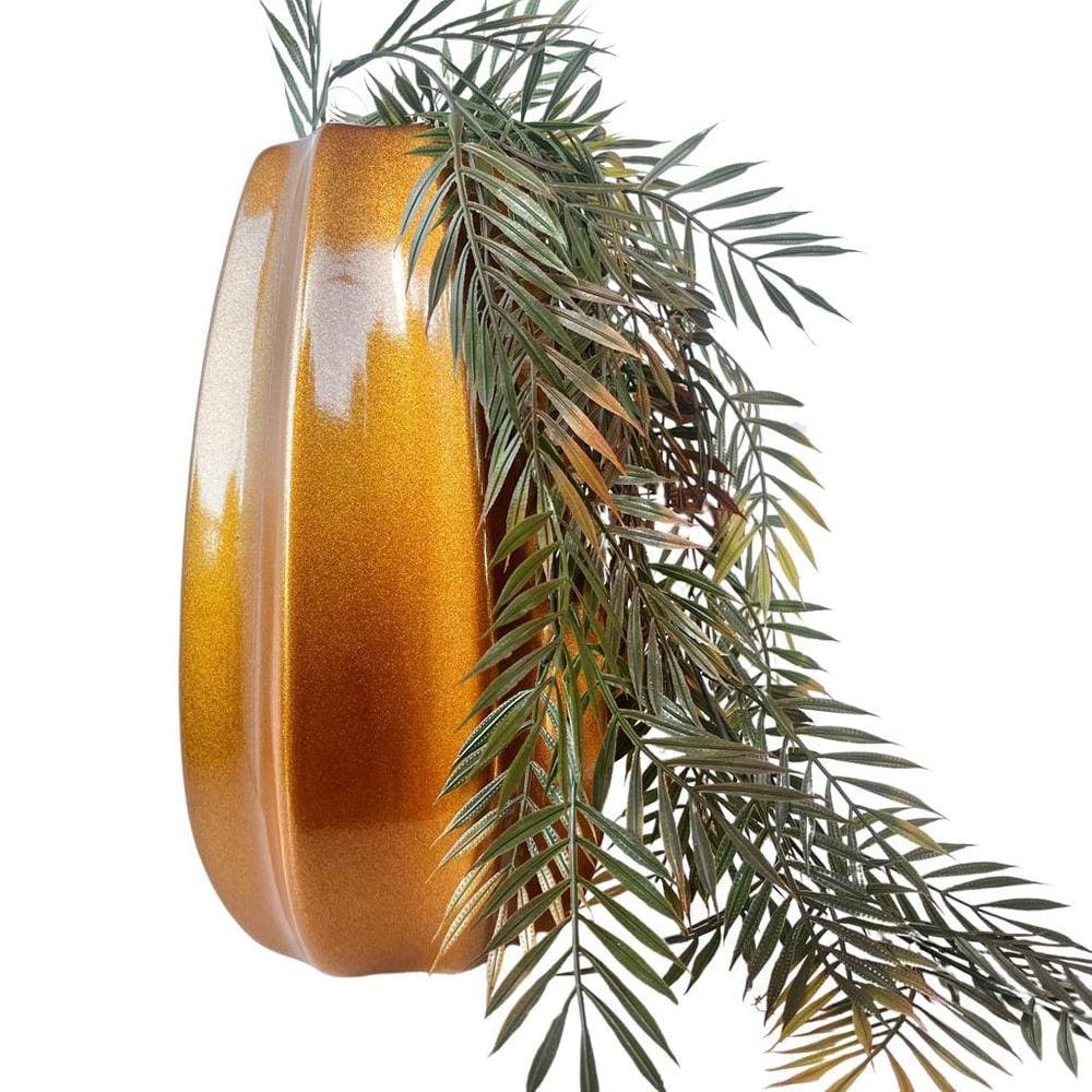 Vaso centro de mesa dourado moderno com planta caída