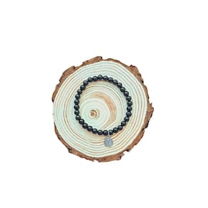Pulseira de pedra l de turmalina preta com São Benedito