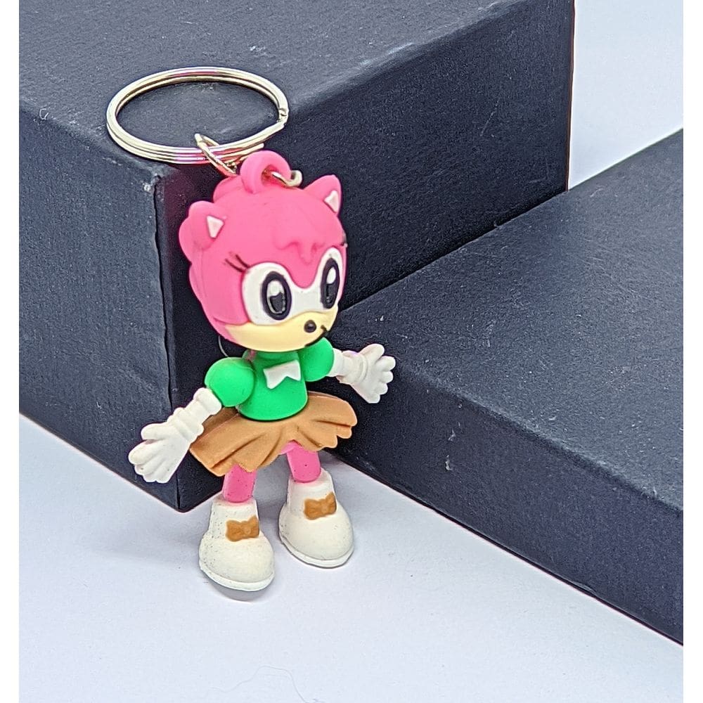 Chaveiro com Pingente Mini Boneco 3D Emborrachado Super Heróis Capitão América Homem aranha Spider Minnie Lembrancinha