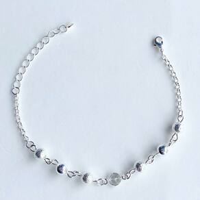 Pulseira bolinhas e ponto de luz