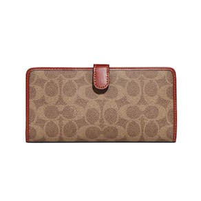 Wallet Coach Essential Slim em lona revestida de bronzeado/ferrugem