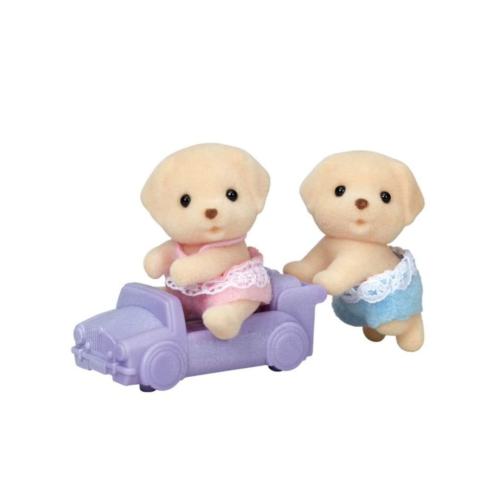 Figura Calico Critters Yellow Labrador Twins com brinquedo Ride-on