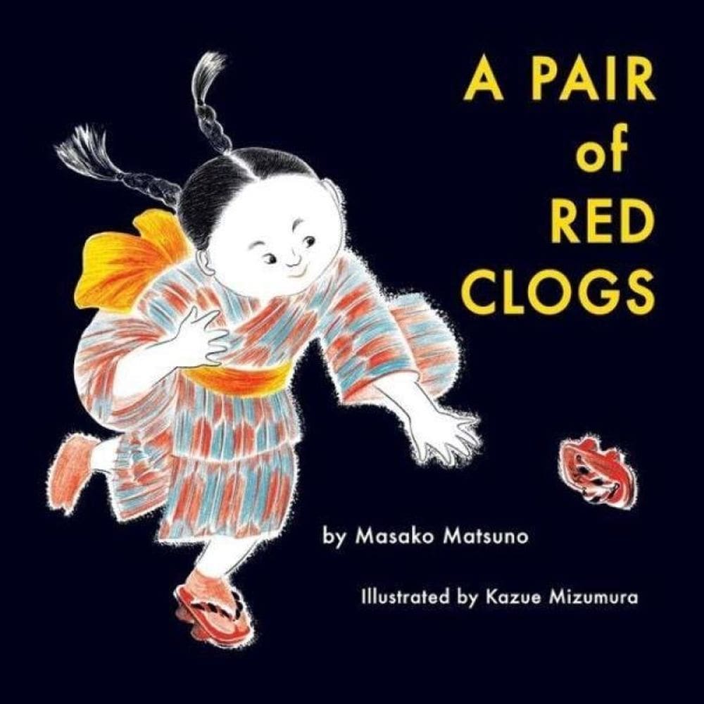 A Pair Of Red Clogs