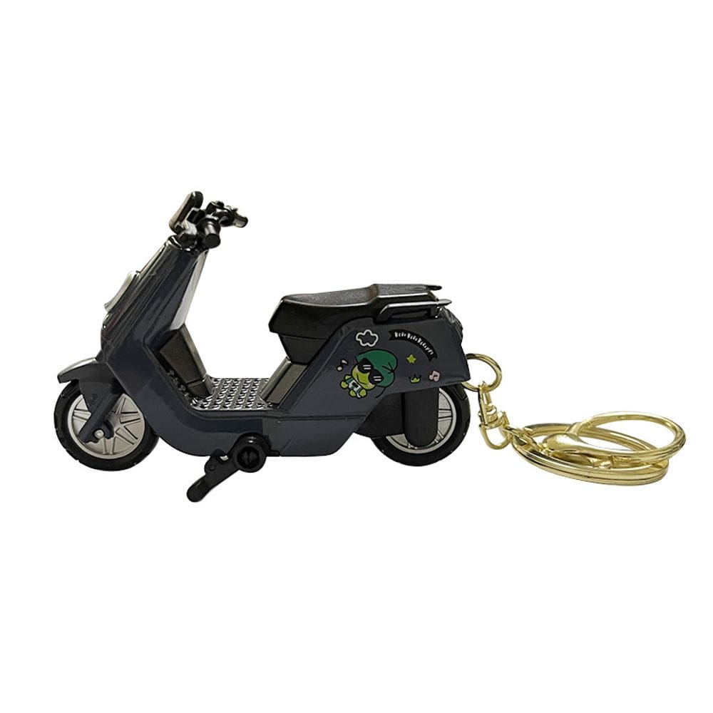 Chaveiro, scooter elétrico, desenho animado, ciclomotor retrô, design de sapo