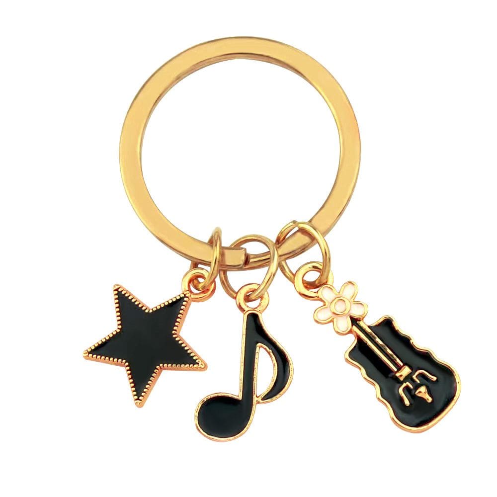 Chaveiro: estrela inspirada na música, nota musical e guitarra em liga de zinco