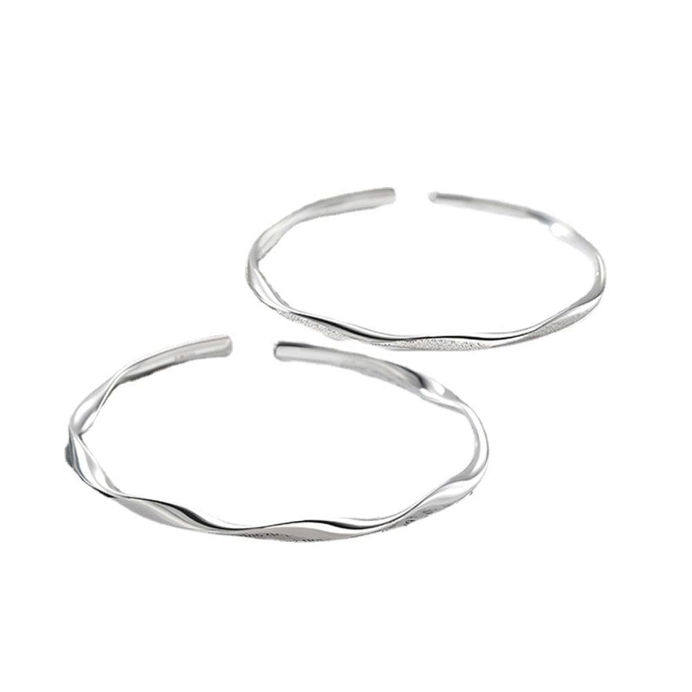 Conjunto de pulseiras de cuproníquel inspirado em Mobius para casal