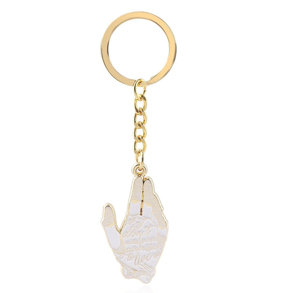 Chaveiro Alita Battle Angel com pingente de mão banhado a ouro